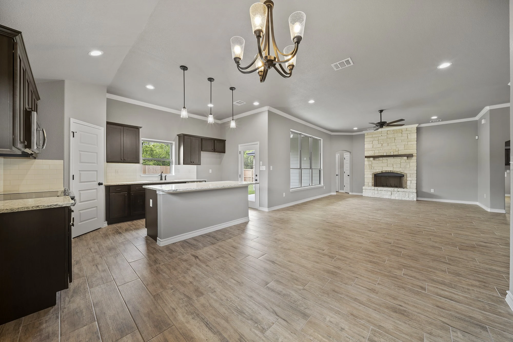 Landmark kitchen with an island and adjacent dining space